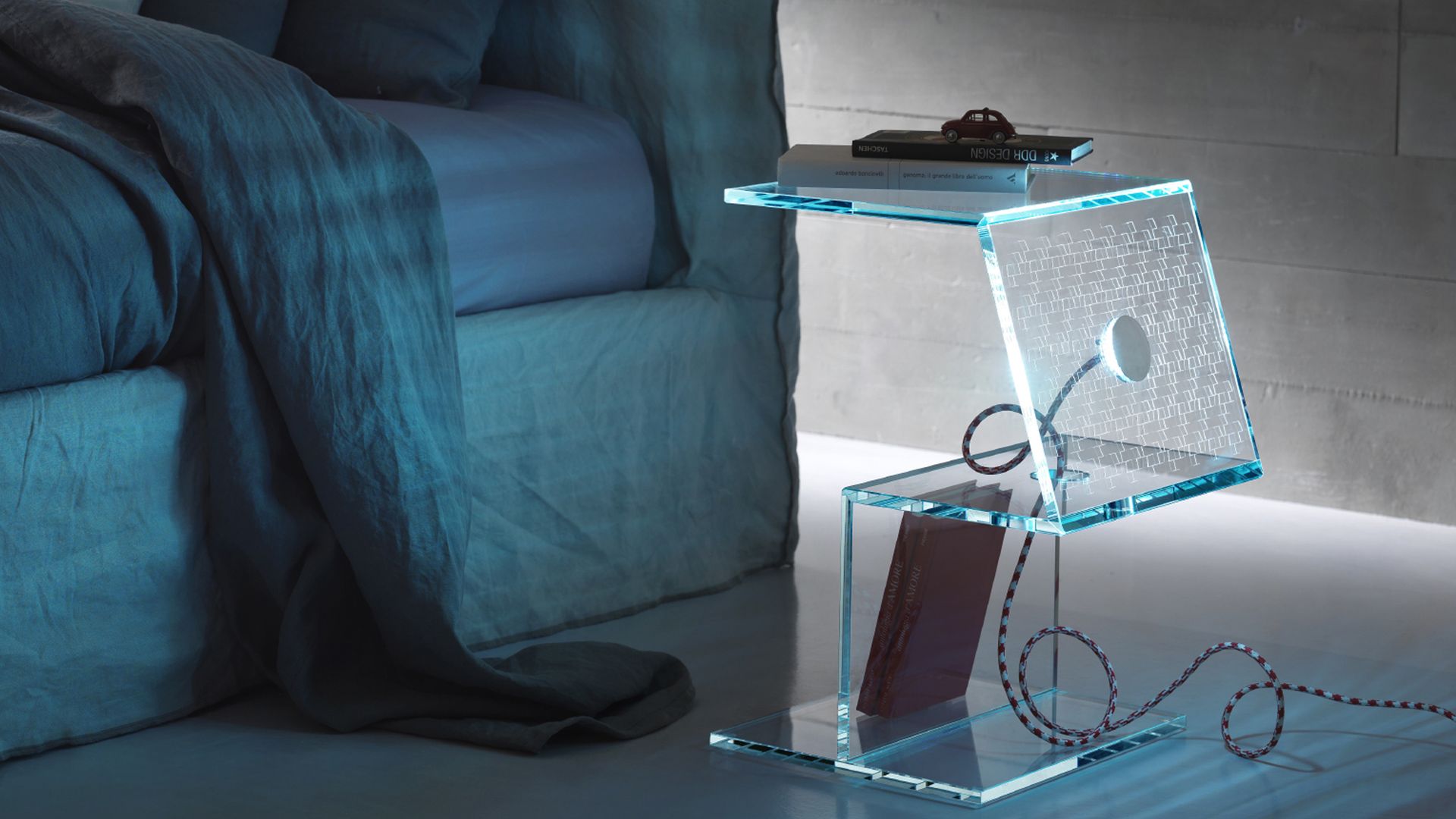 Bedroom detail with glass bedside table